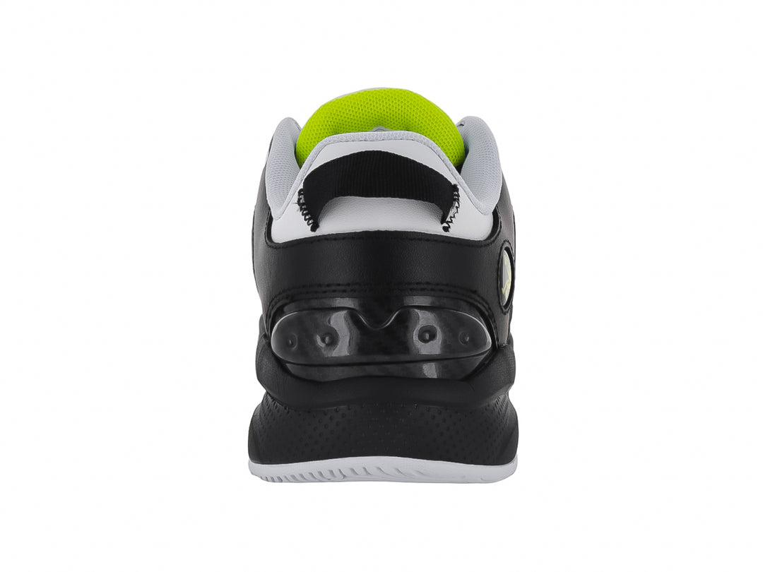 Tenis de baloncesto SHAQ All Ball en colores blanco y negro con detalles en amarillo neón.