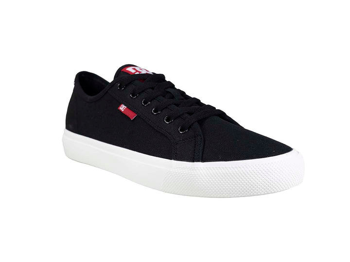 Tenis DC Shoes color negro con suela blanca y detalle en rojo, estilo casual.