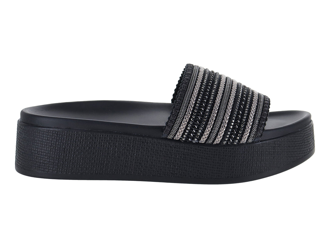Sandalias negras de plataforma con banda superior tejida en tonos negro y gris.