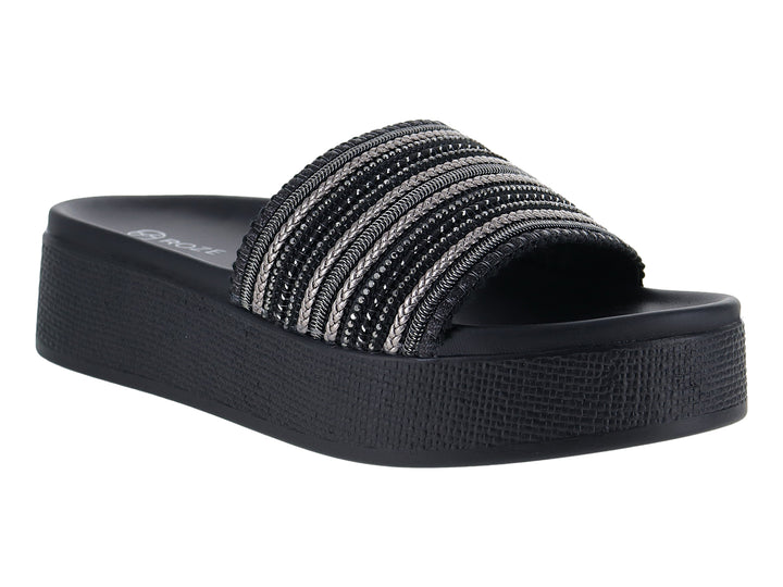 Sandalias negras de plataforma con banda superior tejida en tonos negro y gris.