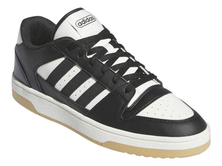Tenis Adidas Break Start en color negro con franjas blancas y suela beige.