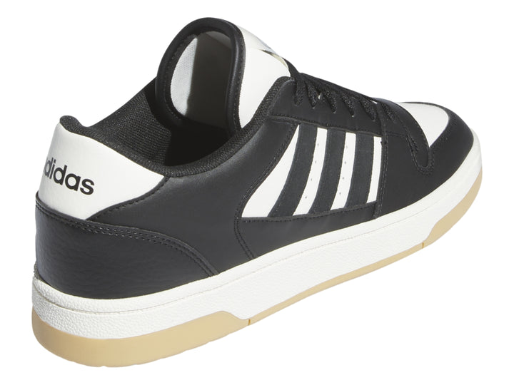 Tenis Adidas Break Start en color negro con franjas blancas y suela beige.