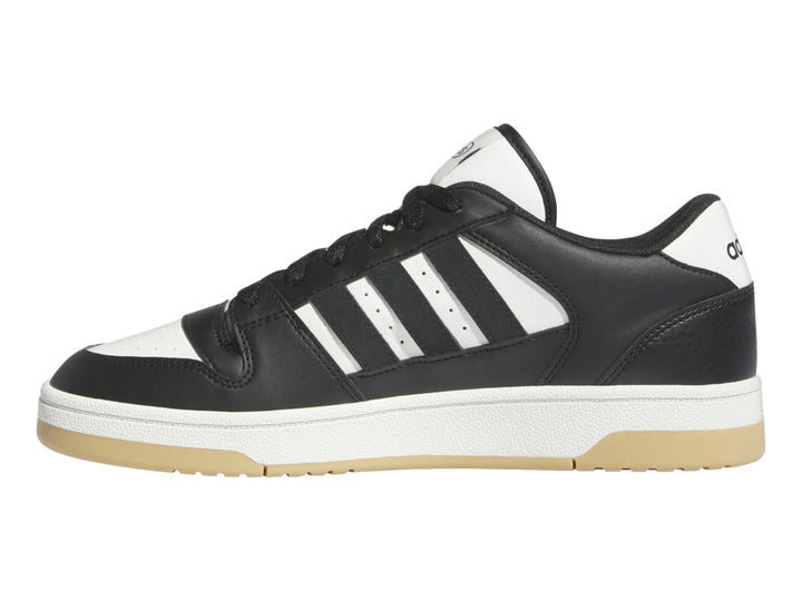 Tenis Adidas Break Start en color negro con franjas blancas y suela beige.