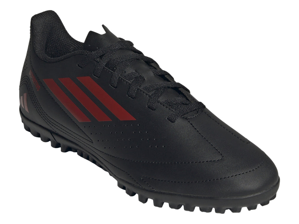 Calzado de fútbol Adidas Deportivo LII TF en color negro con franjas rojas y suela para césped sintético.