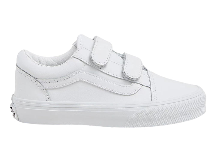 Tenis Vans Old Skool color blanco monocromático con cierre de velcro.
