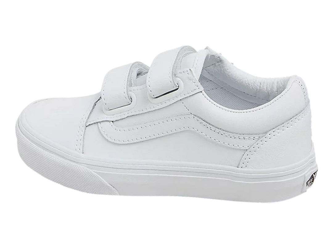Tenis Vans Old Skool color blanco monocromático con cierre de velcro.