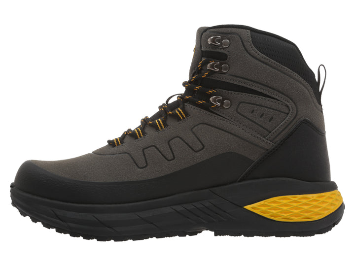 Botas K-Swiss Outdoor en colores oliva, negro y detalles en lima, diseñadas para actividades al aire libre.