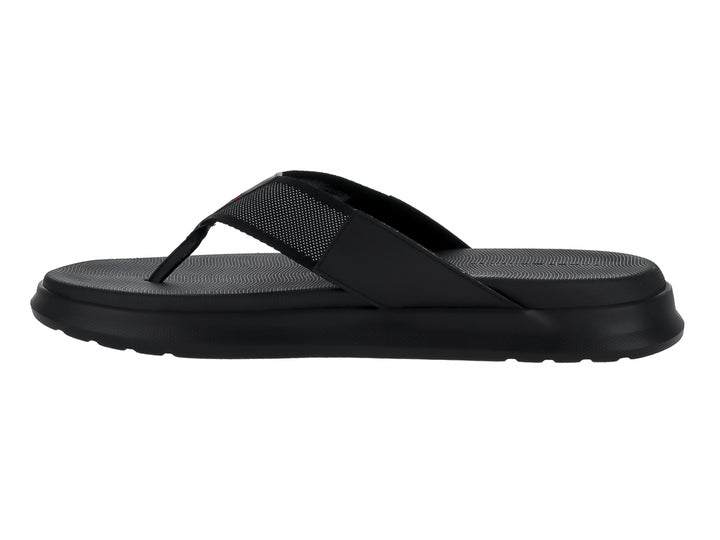 Sandalia de dedo Tommy Hilfiger en color negro con suela ancha y correa texturizada.