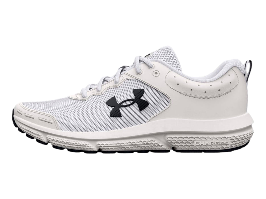 Tenis deportivos Under Armour color blanco con suela blanca y detalles negros en la base.
