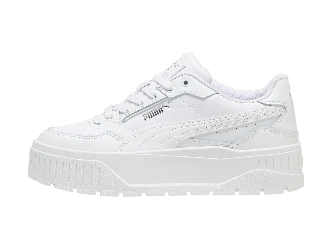 Tenis PUMA blancos modelo Carmen II Idol con suela de plataforma gruesa y detalles en plata.