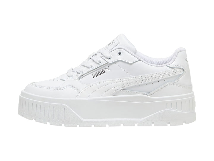 Tenis PUMA blancos modelo Carmen II Idol con suela de plataforma gruesa y detalles en plata.