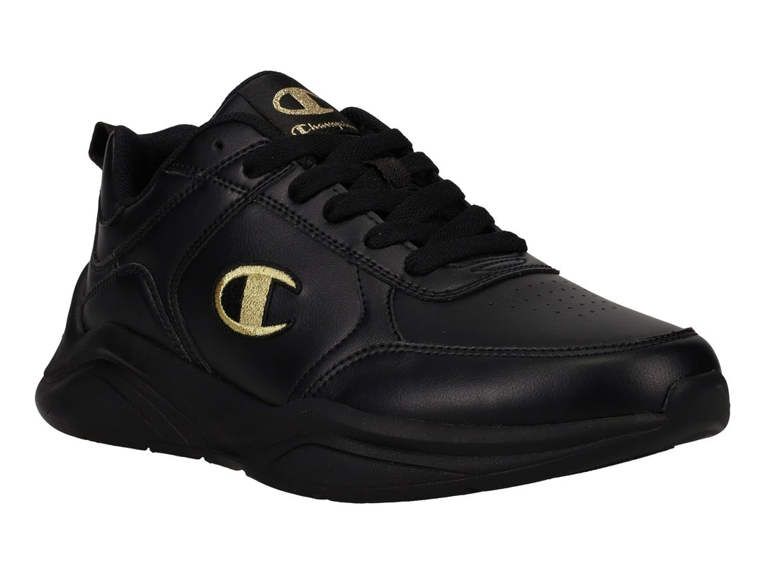 Tenis deportivos Champion color negro con logotipo dorado en el lateral y suela negra.