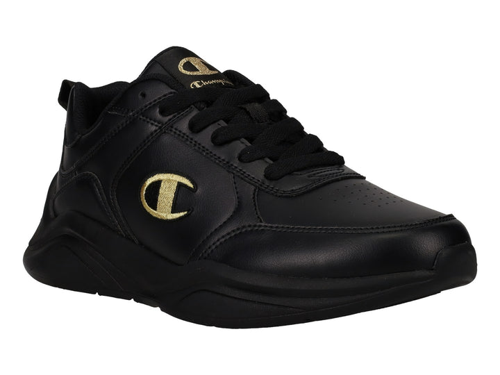 Tenis deportivos Champion color negro con logotipo dorado en el lateral y suela negra.