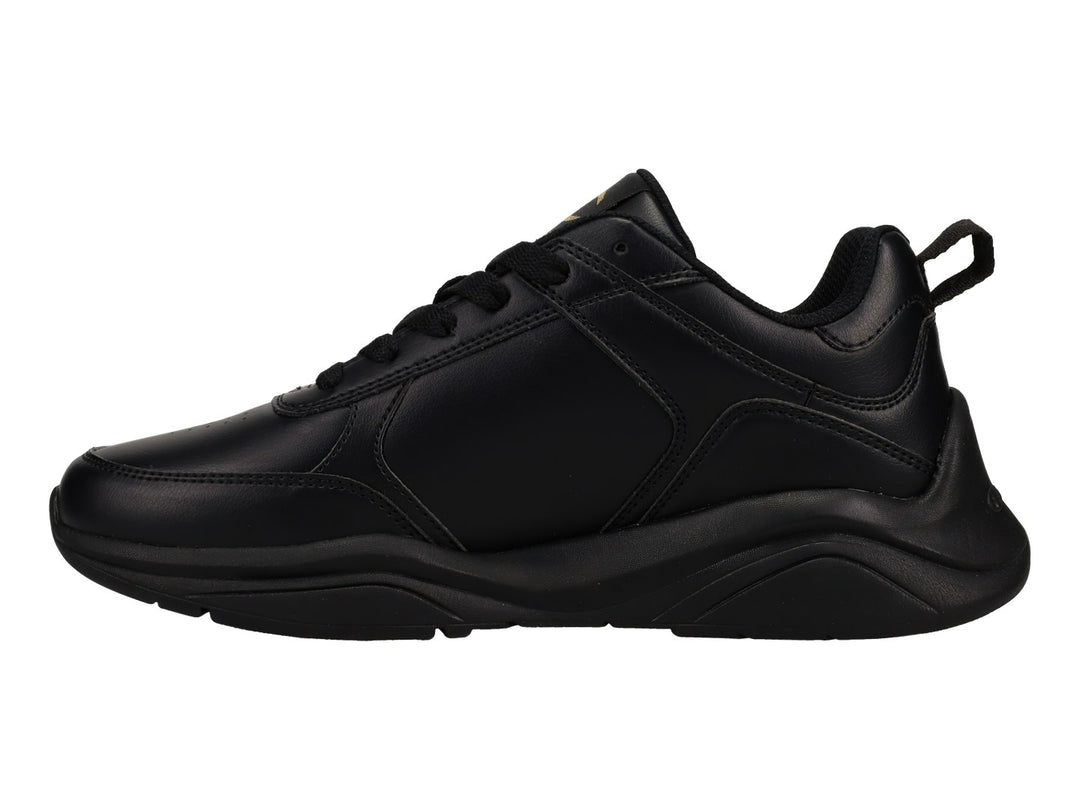 Tenis deportivos Champion color negro con logotipo dorado en el lateral y suela negra.