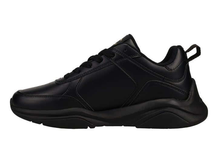 Tenis deportivos Champion color negro con logotipo dorado en el lateral y suela negra.