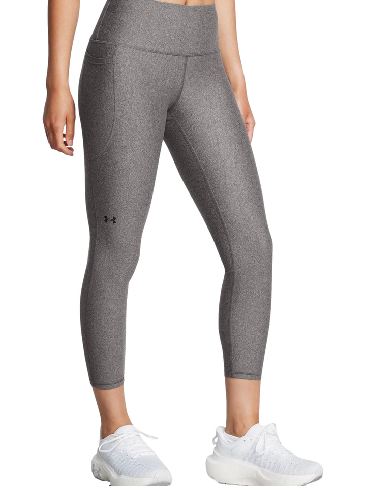 Leggings deportivos de color gris marca Under Armour, ajustados y de cintura alta.