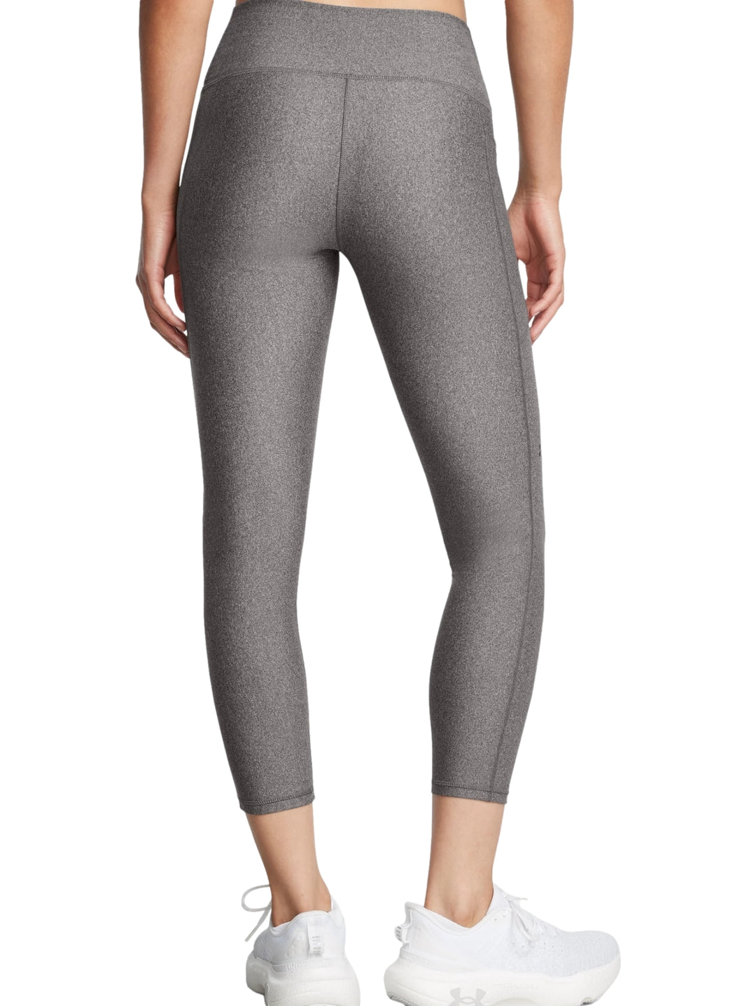Leggings deportivos de color gris marca Under Armour, ajustados y de cintura alta.