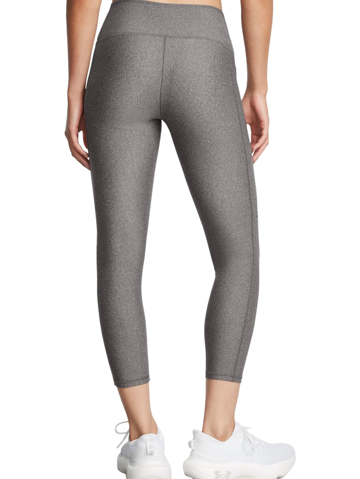 Leggings deportivos de color gris marca Under Armour, ajustados y de cintura alta.