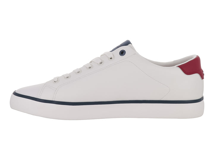 Tenis Tommy Hilfiger color blanco con detalles en azul y rojo, diseño casual de perfil bajo.