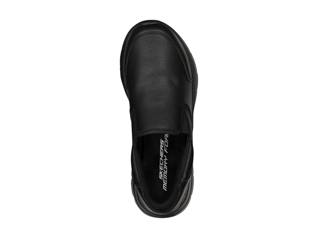 Zapato deportivo Skechers color negro, estilo slip-on sin cordones con suela gruesa.