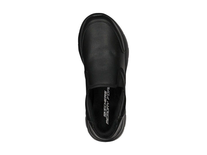 Zapato deportivo Skechers color negro, estilo slip-on sin cordones con suela gruesa.