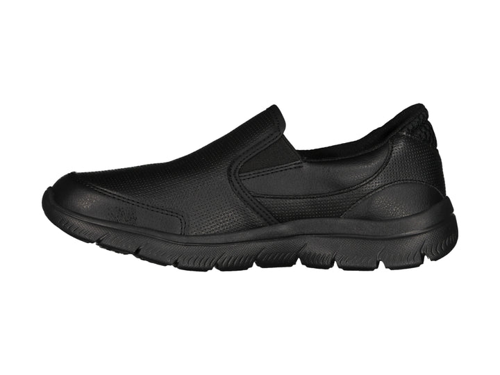 Zapato deportivo Skechers color negro, estilo slip-on sin cordones con suela gruesa.