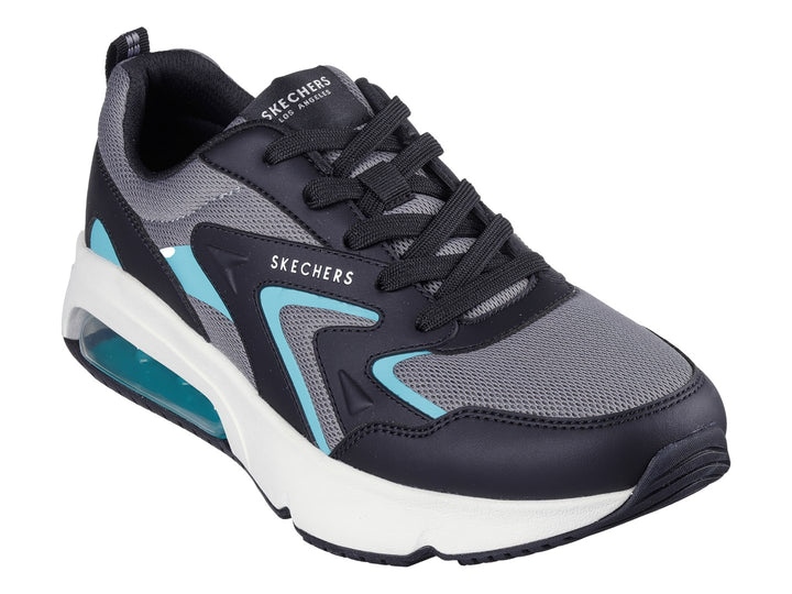 Tenis deportivos Skechers color negro, gris y aqua con suela blanca y amortiguación de aire.