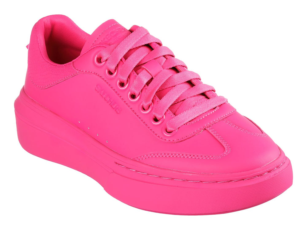 Tenis SKECHERS color fucsia con suela de plataforma y cordones.
