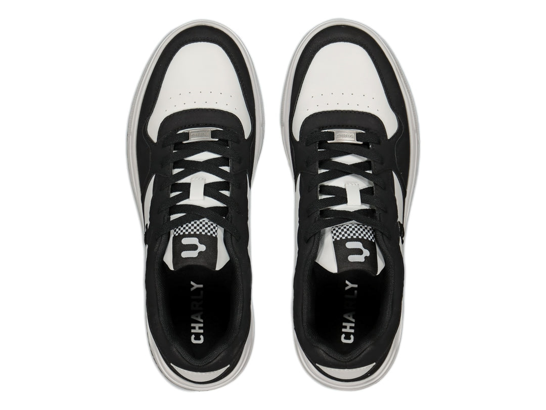 Tenis deportivos Charly en colores blanco y negro con suela blanca y diseño casual.