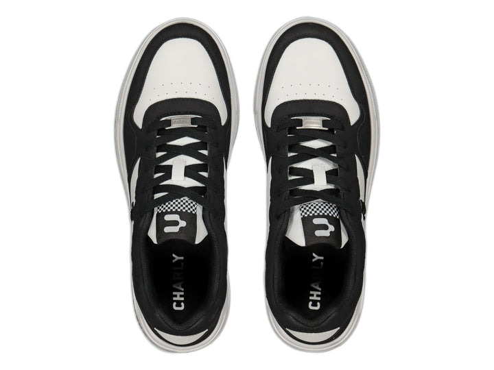 Tenis deportivos Charly en colores blanco y negro con suela blanca y diseño casual.