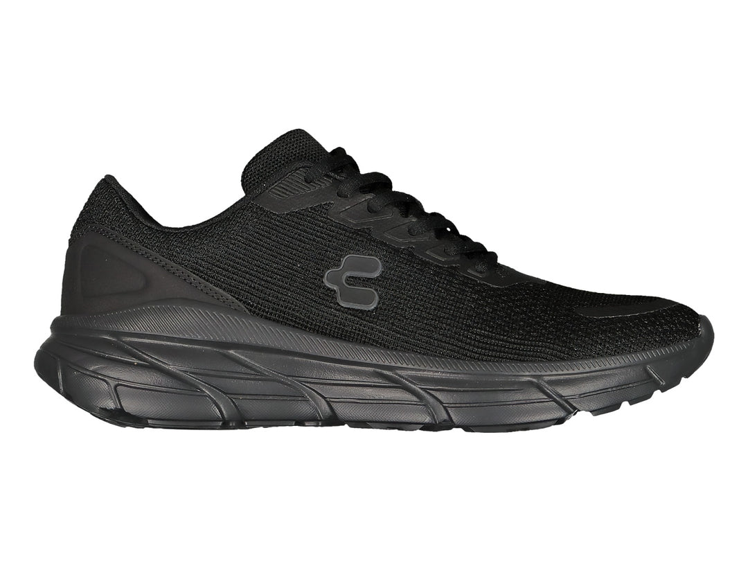 Tenis deportivos Charly color negro con suela robusta y tejido transpirable.