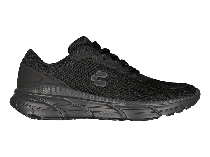 Tenis deportivos Charly color negro con suela robusta y tejido transpirable.