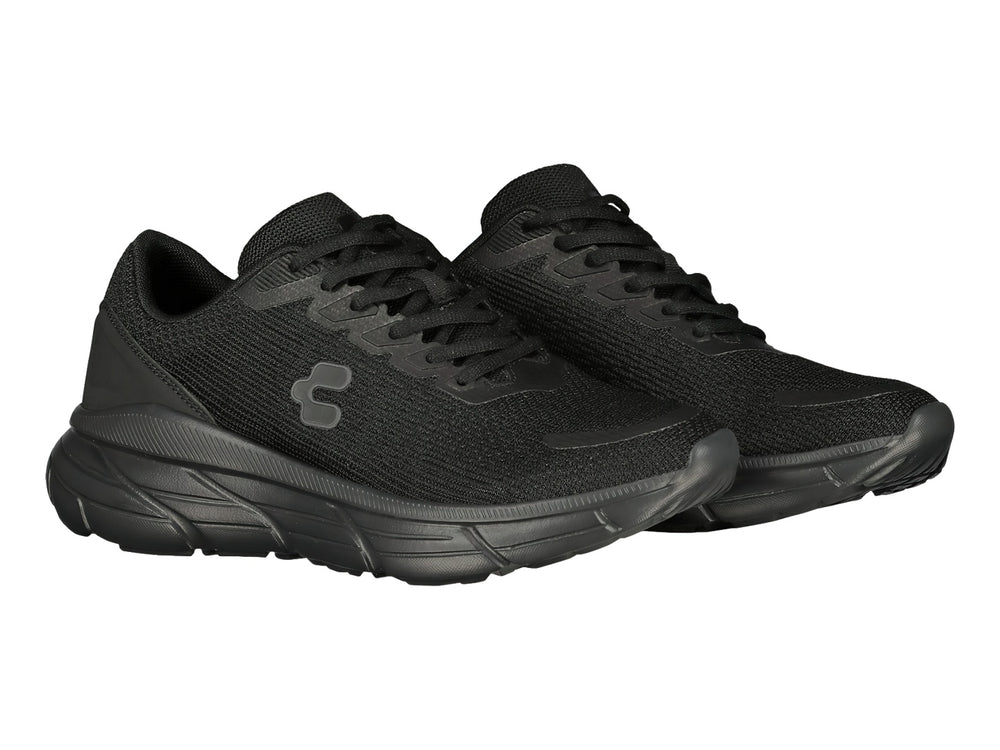 Tenis deportivos Charly color negro con suela robusta y tejido transpirable.