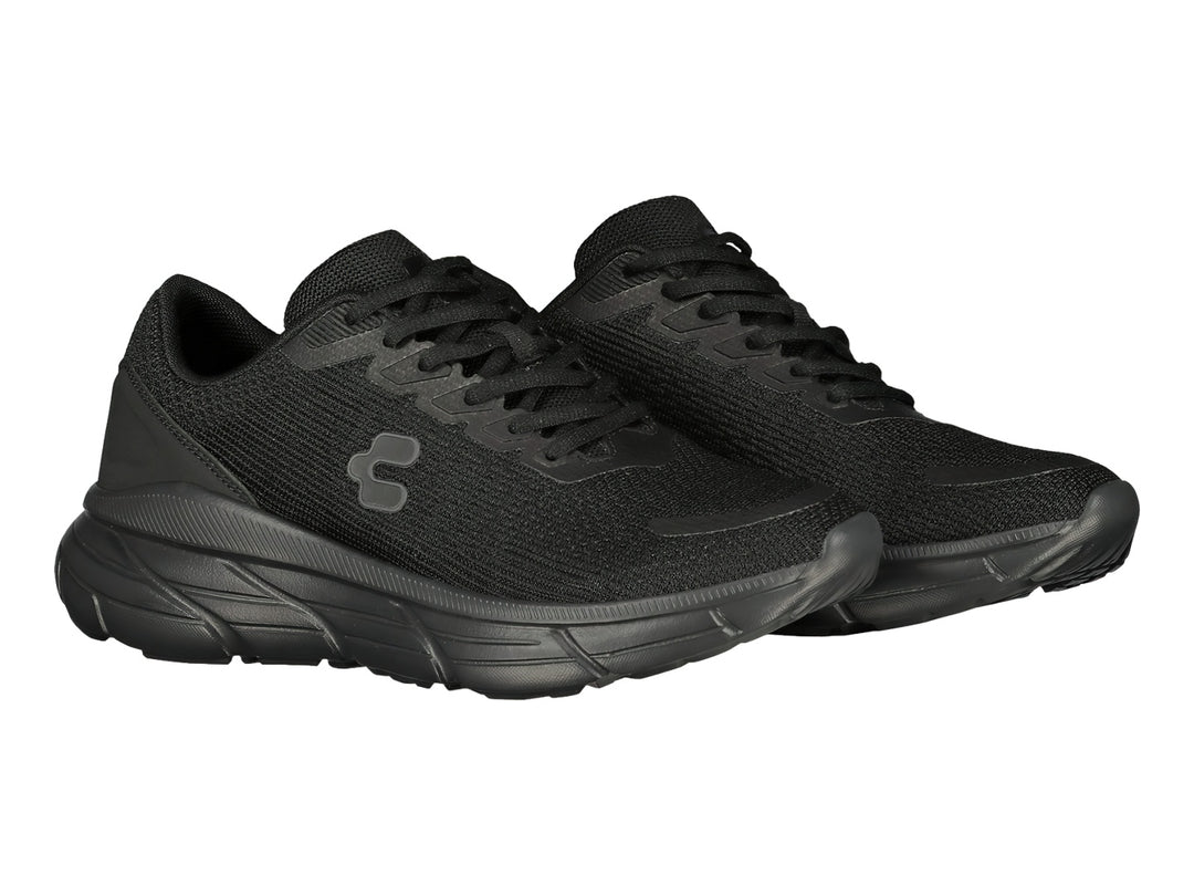 Tenis deportivos Charly color negro con suela robusta y tejido transpirable.