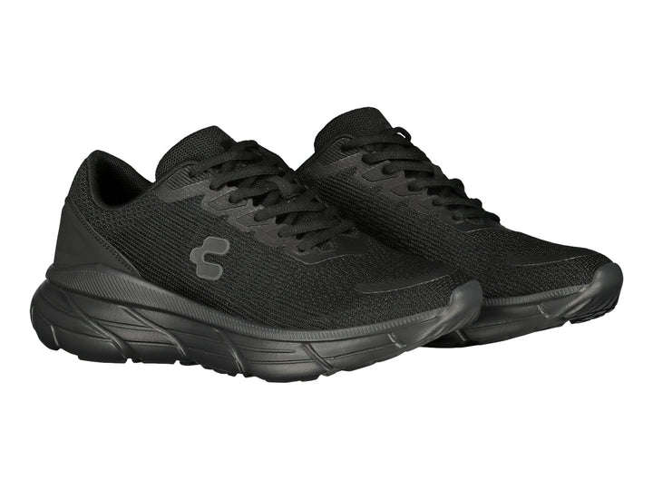 Tenis deportivos Charly color negro con suela robusta y tejido transpirable.
