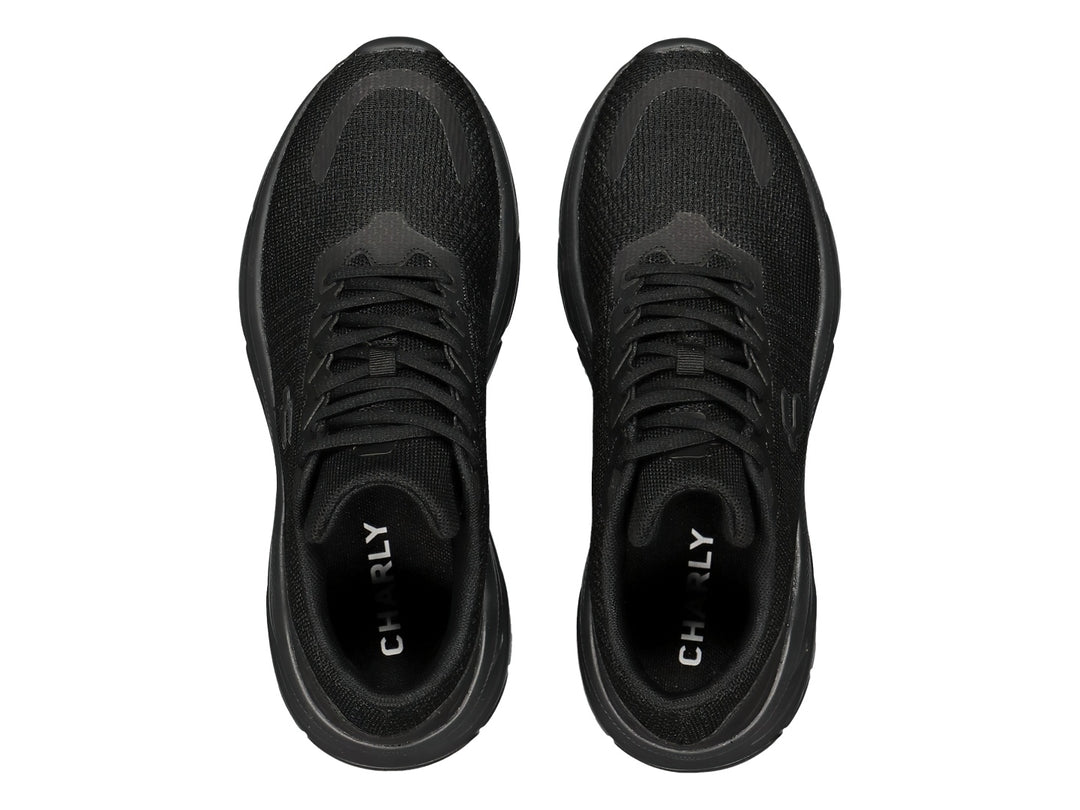 Tenis deportivos Charly color negro con suela robusta y tejido transpirable.