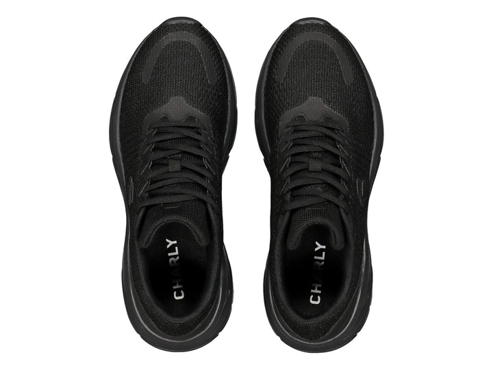 Tenis deportivos Charly color negro con suela robusta y tejido transpirable.