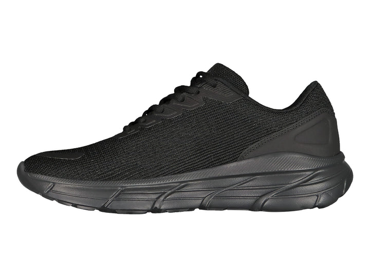 Tenis deportivos Charly color negro con suela robusta y tejido transpirable.