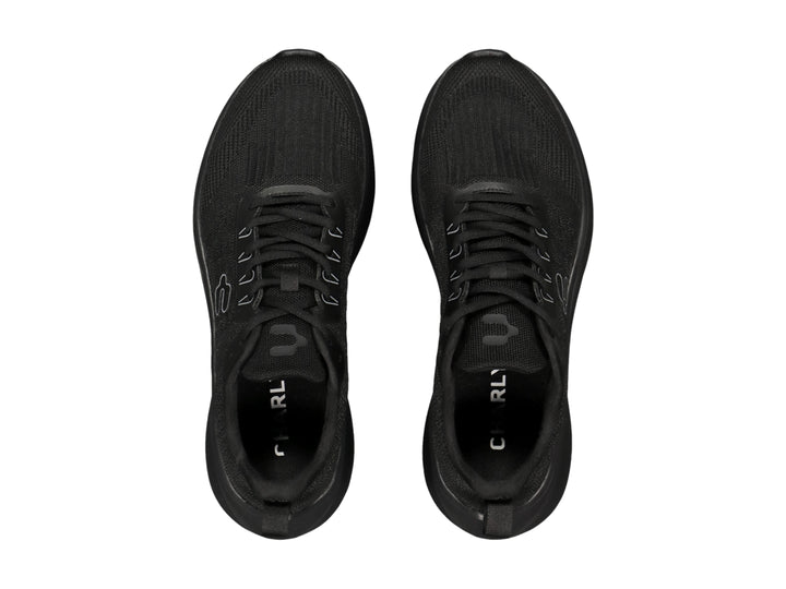 Tenis deportivos Charly color negro total con suela ergonómica y tejido transpirable.