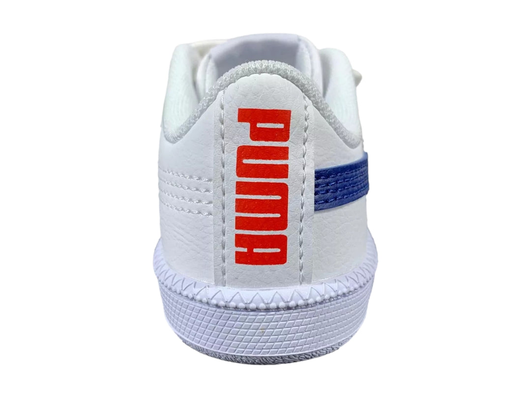 Tenis PUMA infantiles blancos con franja azul y cierres de velcro.