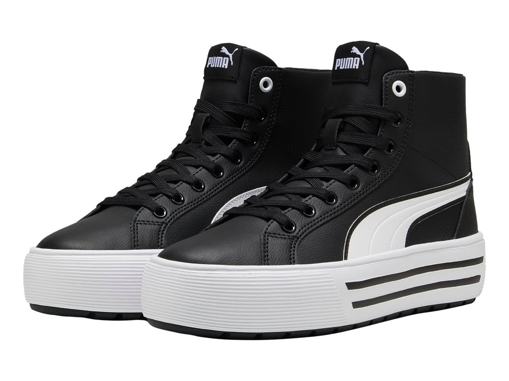 Tenis PUMA Kaia 2.0 Mid color negro con suela de plataforma blanca y franja lateral blanca.