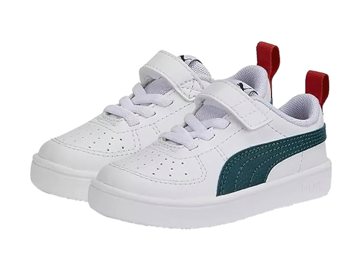Tenis PUMA blancos para bebé con franja azul marino y pestaña roja en el talón.