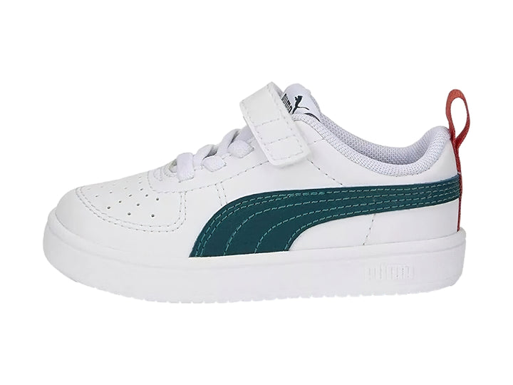 Tenis PUMA blancos para bebé con franja azul marino y pestaña roja en el talón.