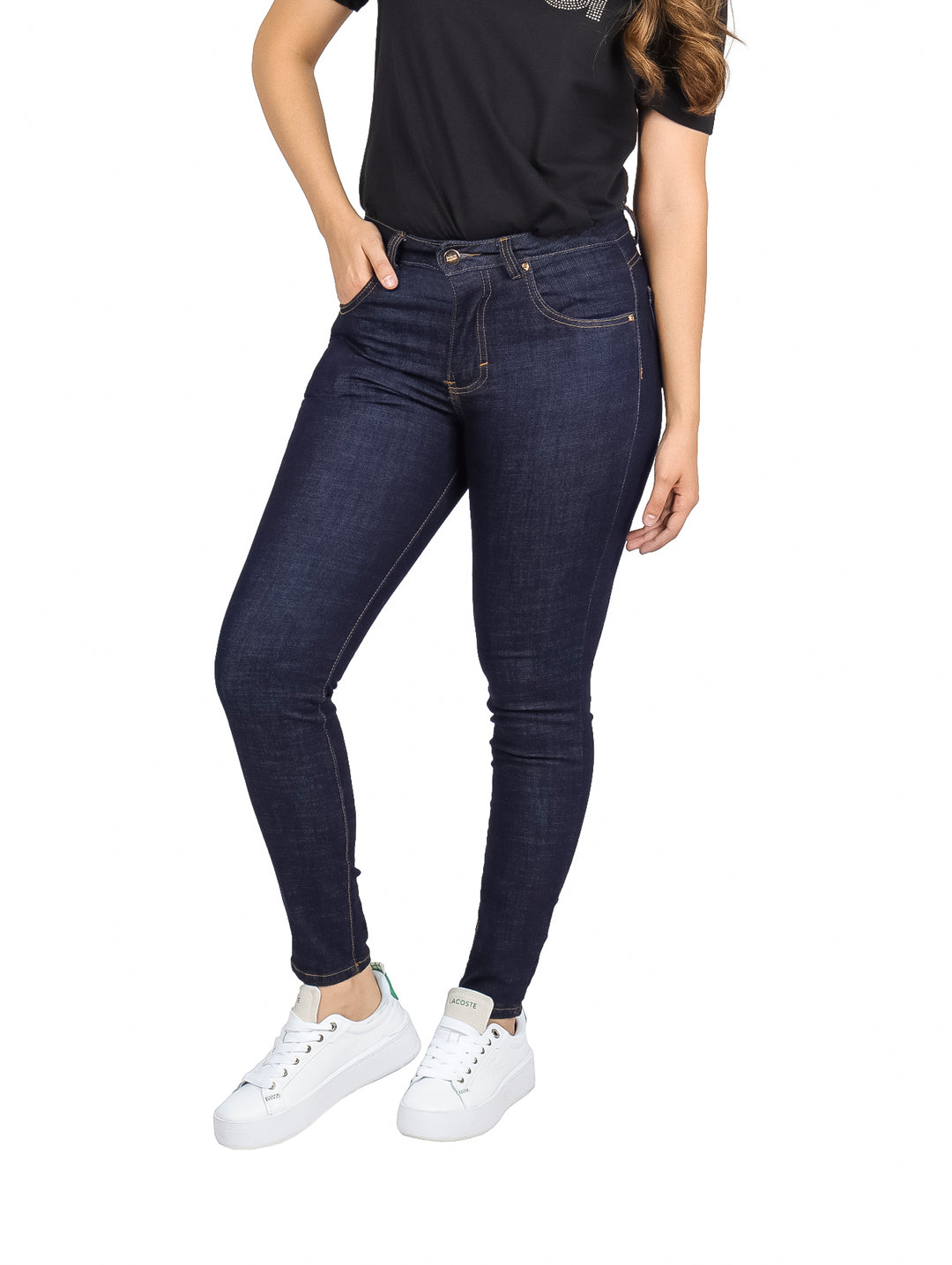 Pantalones jeans ajustados de color azul oscuro para mujer.