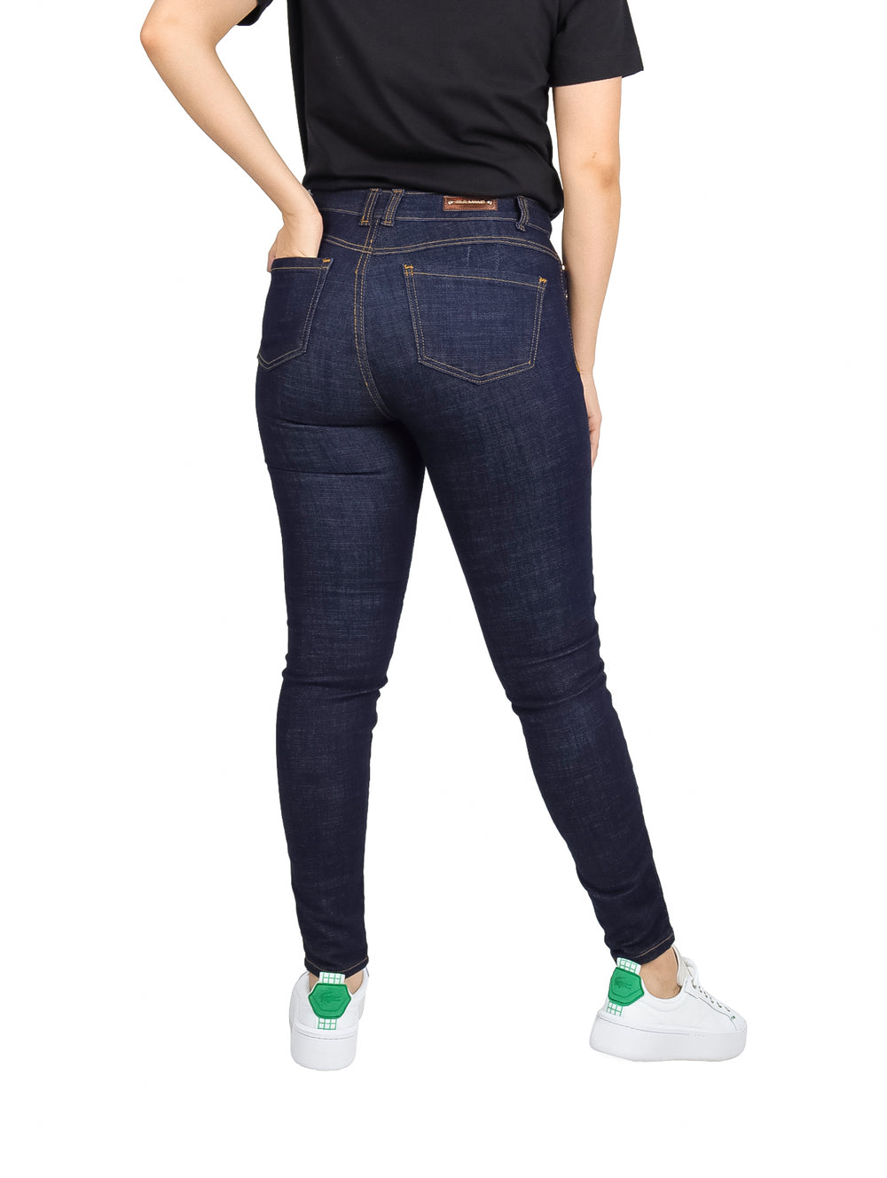 Pantalones jeans ajustados de color azul oscuro para mujer.