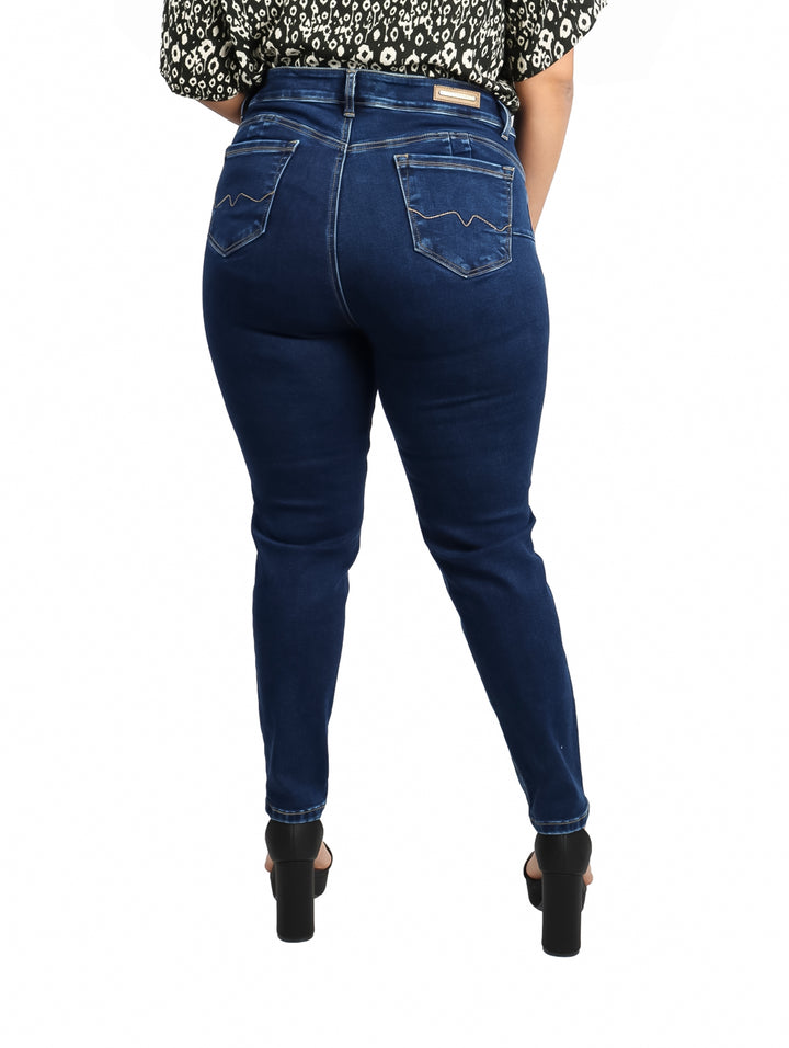 Jeans ajustados para mujer en color azul oscuro.