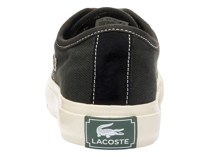 Tenis Lacoste Backcourt 124 de color negro con suela y cordones blancos.