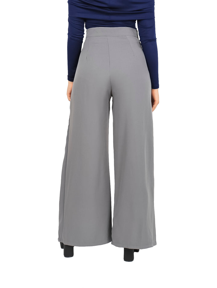 Pantalón ancho color gris con pinzas y talle alto.