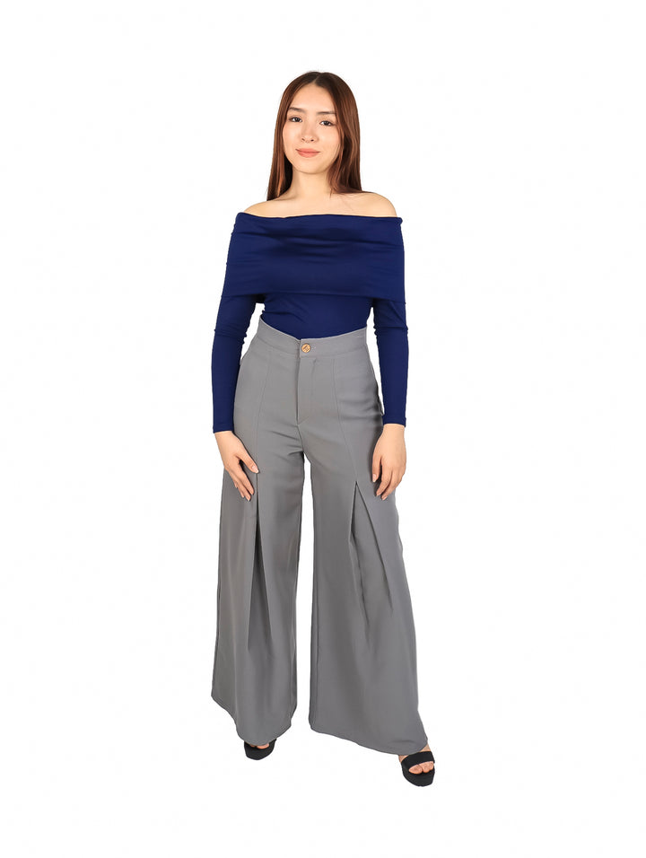Pantalón ancho color gris con pinzas y talle alto.