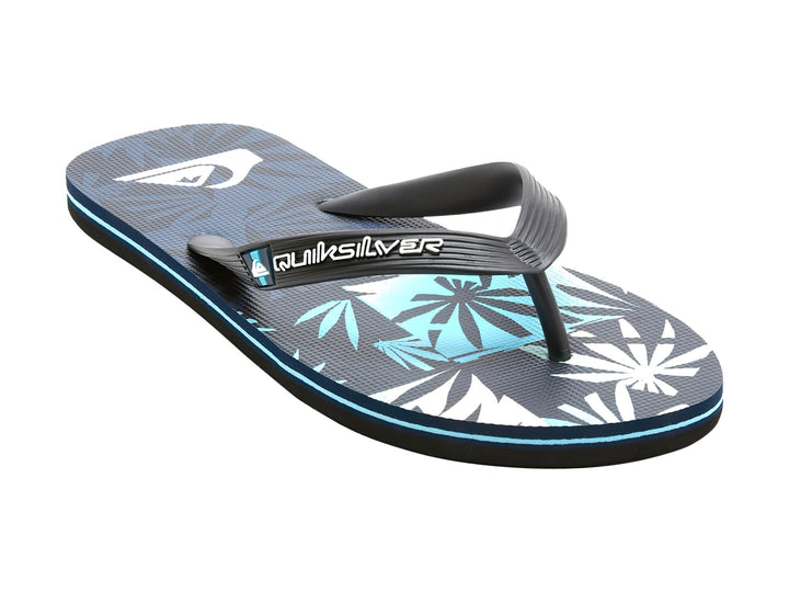 Sandalias Quiksilver color negro con detalles azules y diseño gráfico en la plantilla.